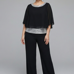 Women's two-piece set by THE WHITMORE FAMILY with an embellished neckline and wide-leg trousers, in black.