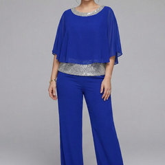 Women's two-piece set by THE WHITMORE FAMILY featuring an embellished neckline and wide-leg trousers in black.