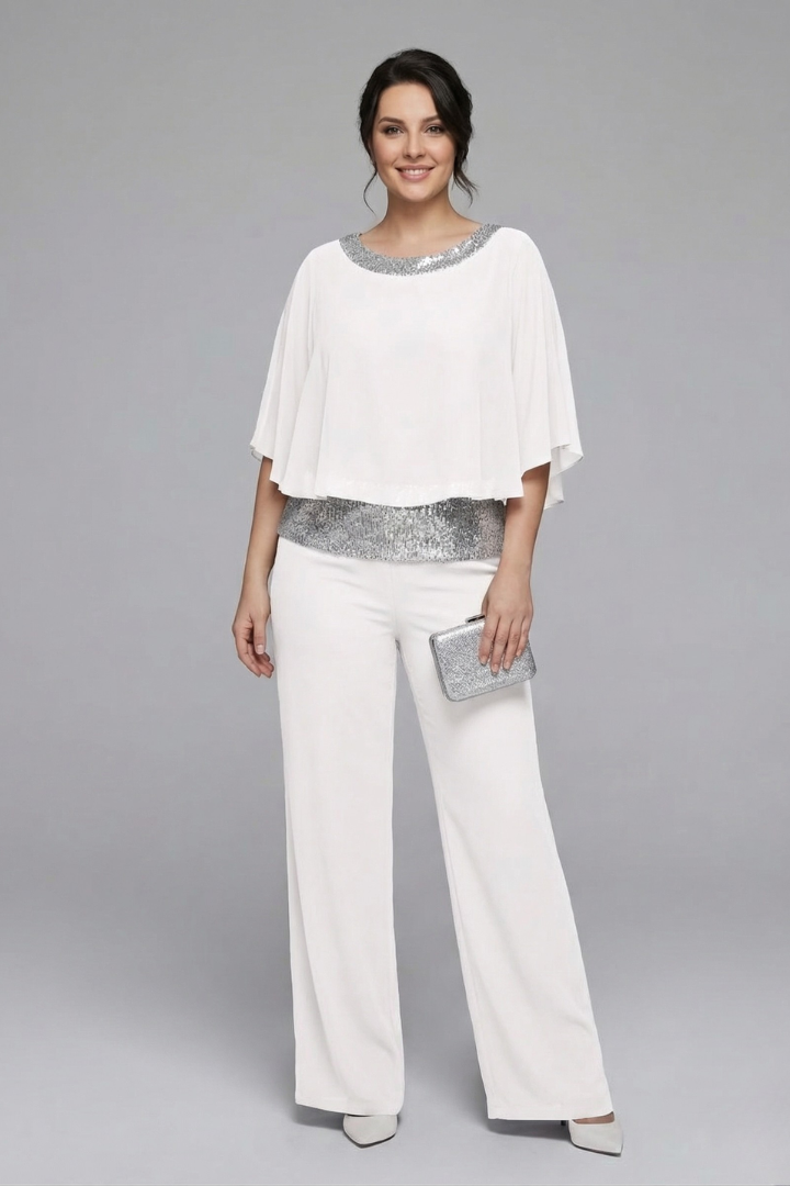 Women's two-piece set with embellished neckline and wide-leg trousers from THE WHITMORE FAMILY, stylish and elegant outfit.