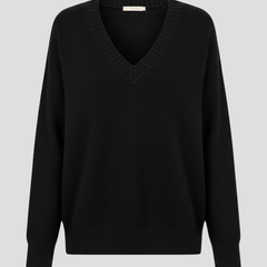 Women’s V-neck sweater with long sleeves and pullover design by THE WHITMORE FAMILY, shown in a cozy knit style.