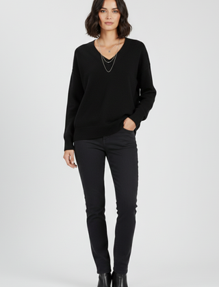 Women's V-neck sweater with long sleeves and pullover design by THE WHITMORE FAMILY, shown in a cozy, stylish fit.