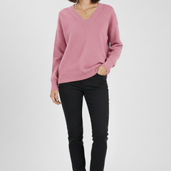 Women’s V-neck sweater with long sleeves and pullover design by THE WHITMORE FAMILY, shown in a cozy, stylish fit.