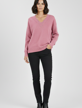 Women’s V-neck sweater with long sleeves and pullover design by THE WHITMORE FAMILY, shown in a cozy, stylish fit.
