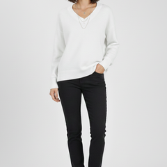 Women’s V-neck sweater with long sleeves and pullover style, from THE WHITMORE FAMILY, featuring a cozy and classic design.