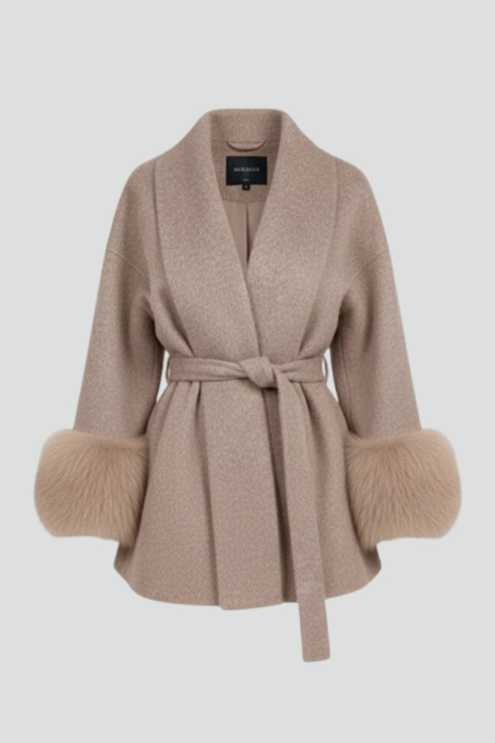 Beige women's belted full-length coat with waist tie from THE WHITMORE FAMILY, showcasing a stylish jacket with a classic silhouette.
