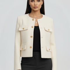 Women’s black cropped jacket with button front by THE WHITMORE FAMILY, featuring a stylish, fitted design and long sleeves.