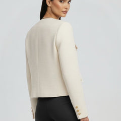 Black women's cropped jacket with button front from THE WHITMORE FAMILY, stylish and lightweight for casual wear.