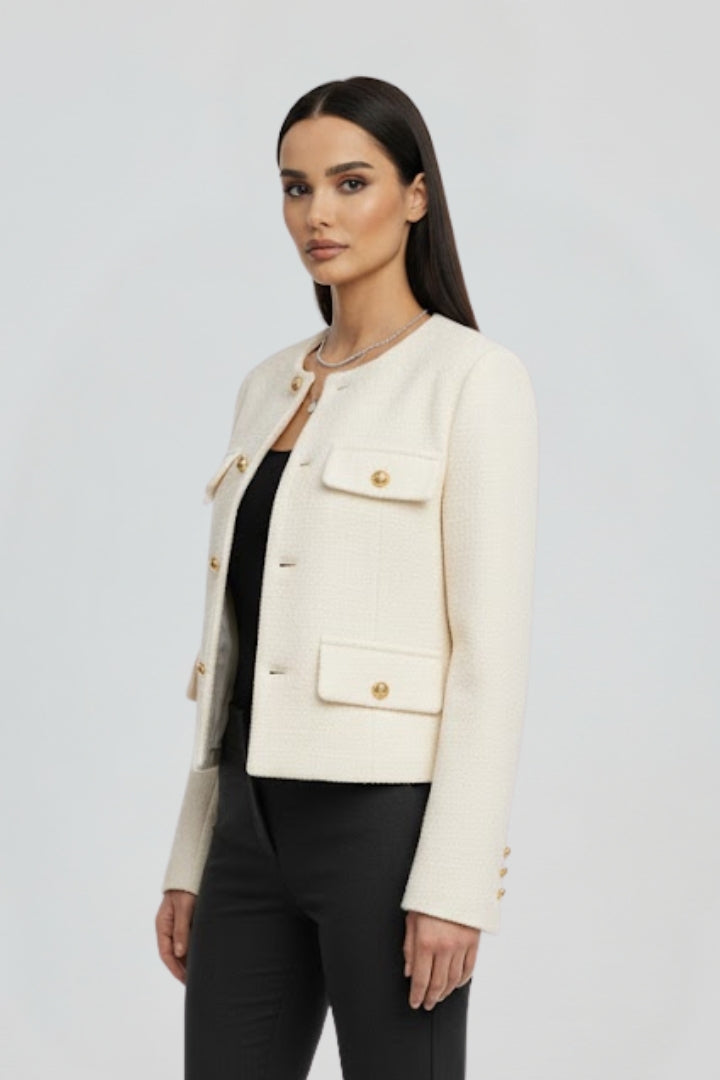 Black women’s cropped jacket with button front from THE WHITMORE FAMILY, stylish and lightweight for casual wear.