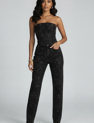 Women's strapless top and high-waisted trousers set by THE WHITMORE FAMILY, featuring black glittering fabric and stylish high waist design.