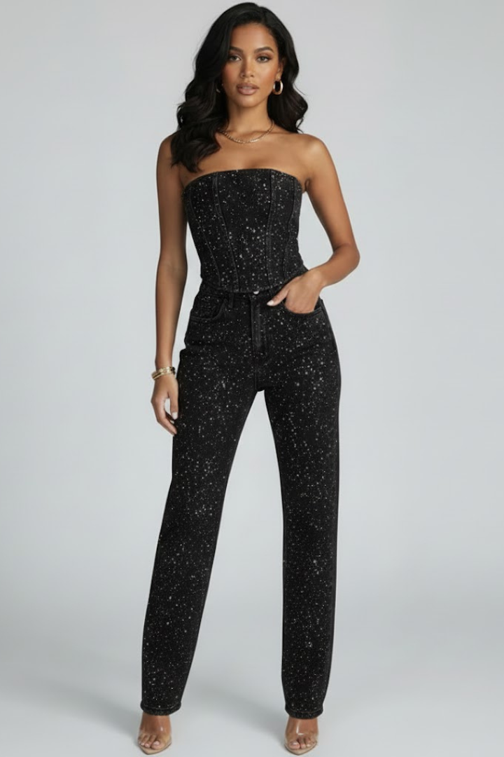 Women's strapless top and high-waisted trousers set by THE WHITMORE FAMILY, featuring black glittering fabric and stylish high waist design.