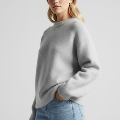 Women’s oversized knitted sweater with round neckline and dropped shoulders, from THE WHITMORE FAMILY. Soft, cozy knitwear.