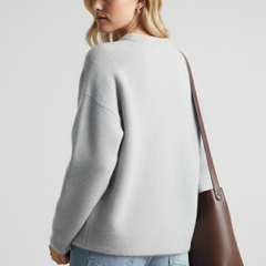 Women’s knitted sweater with round neckline and dropped shoulders, oversized style from THE WHITMORE FAMILY.