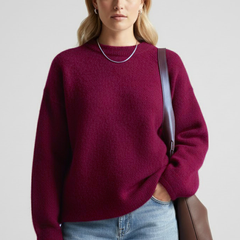 Women’s oversized knitted sweater with round neckline and dropped shoulders, by THE WHITMORE FAMILY, showcasing soft, cozy knit fabric.
