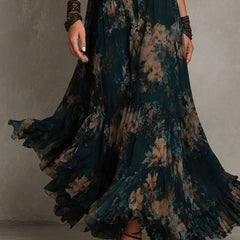 Gillian™ Maxi Dress by THE WHITMORE FAMILY in XS, flowing fabric with a floral pattern, sleeveless design, and V-neck style.