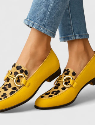 Yellow leopard print relaxed fit loafers by THE WHITMORE FAMILY featuring comfortable slip-on design and stylish pattern.