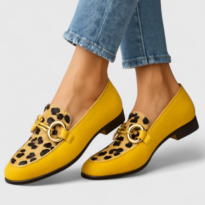 Yellow leopard print relaxed fit loafers by THE WHITMORE FAMILY featuring comfortable slip-on design and stylish pattern.