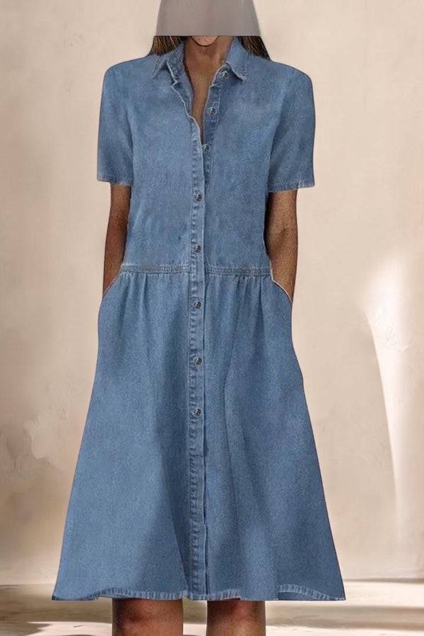 Blue denim button dress from THE WHITMORE FAMILY's Allyssia collection, featuring a stylish and elegant design.