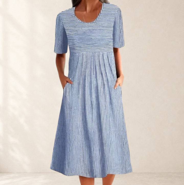 Blue and white striped Felyzette midi dress by THE WHITMORE FAMILY featuring pockets, made from comfortable fabric.