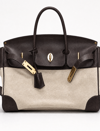 The Eleanor Weekender bag by THE WHITMORE FAMILY, featuring a front view with leather accents and spacious design for travel.