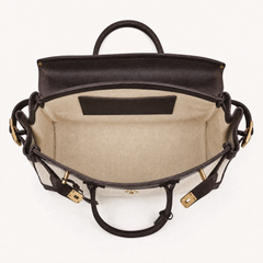 Interior view of THE WHITMORE FAMILY Eleanor Weekender bag showing spacious compartments and stylish design details.