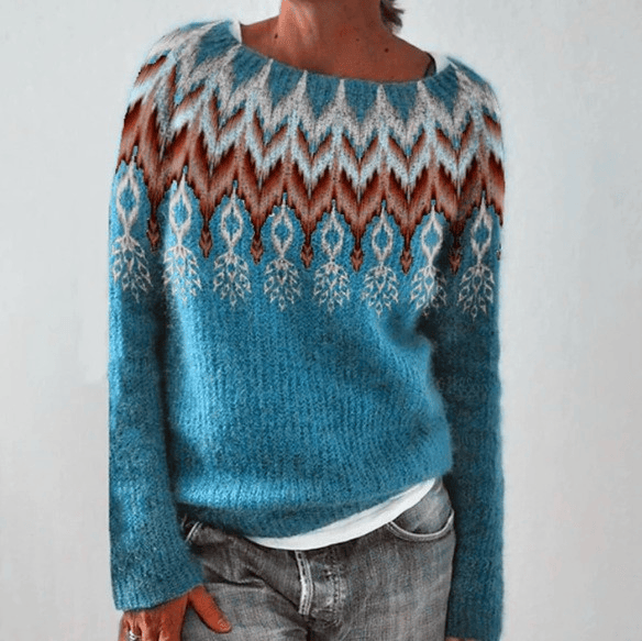 Eva retro Scandinavian knitted sweater by THE WHITMORE FAMILY, featuring a cozy, patterned design in vibrant colors.